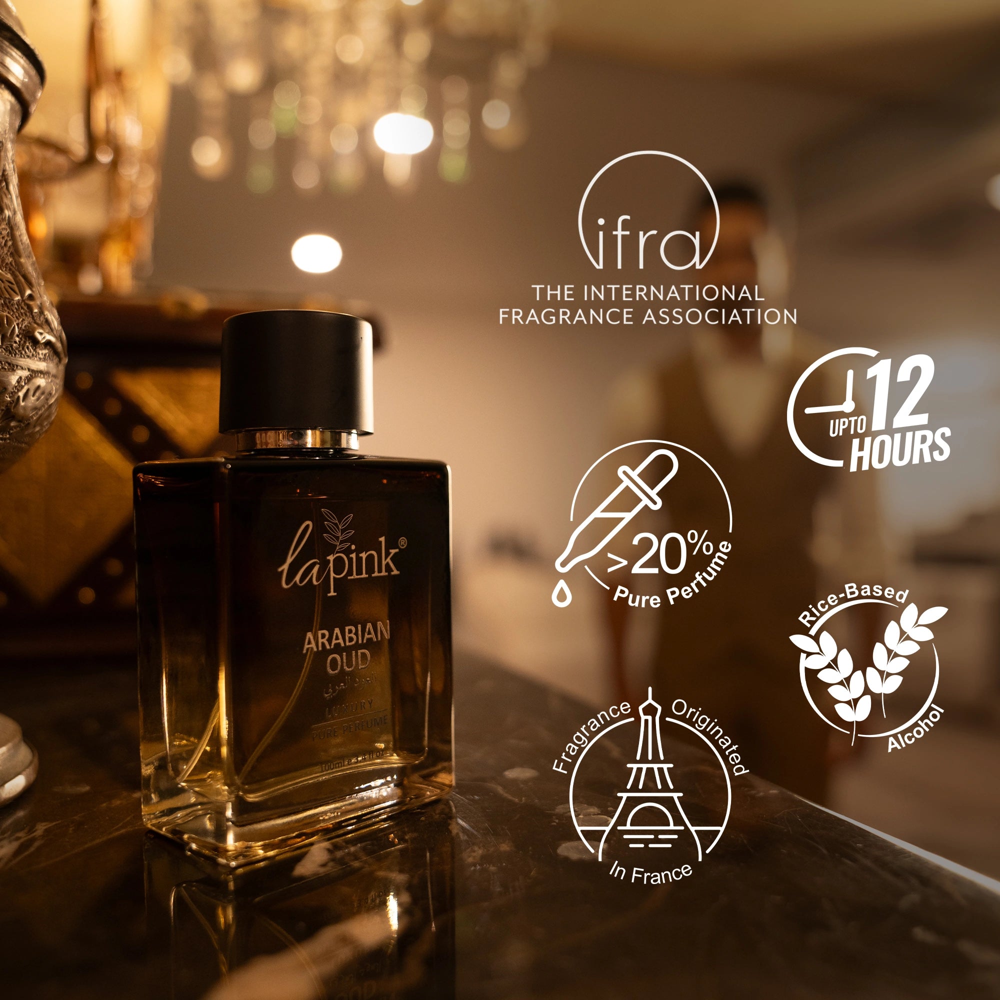Lapink Arabian Oud perfume bottle on a reflective surface with brand logos and text.
