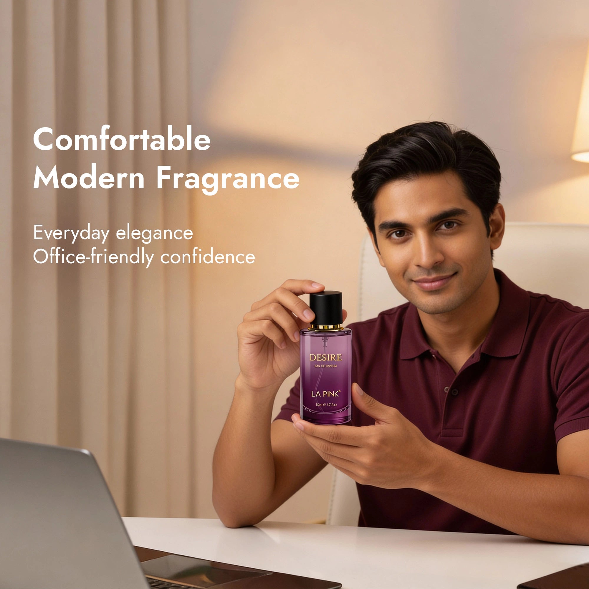 Man holding a purple perfume bottle with text about fragrance in a home office setting