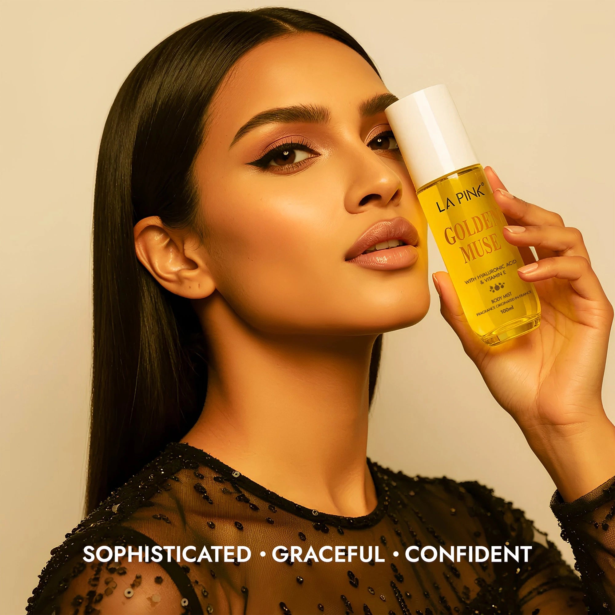 Woman holding a bottle of &