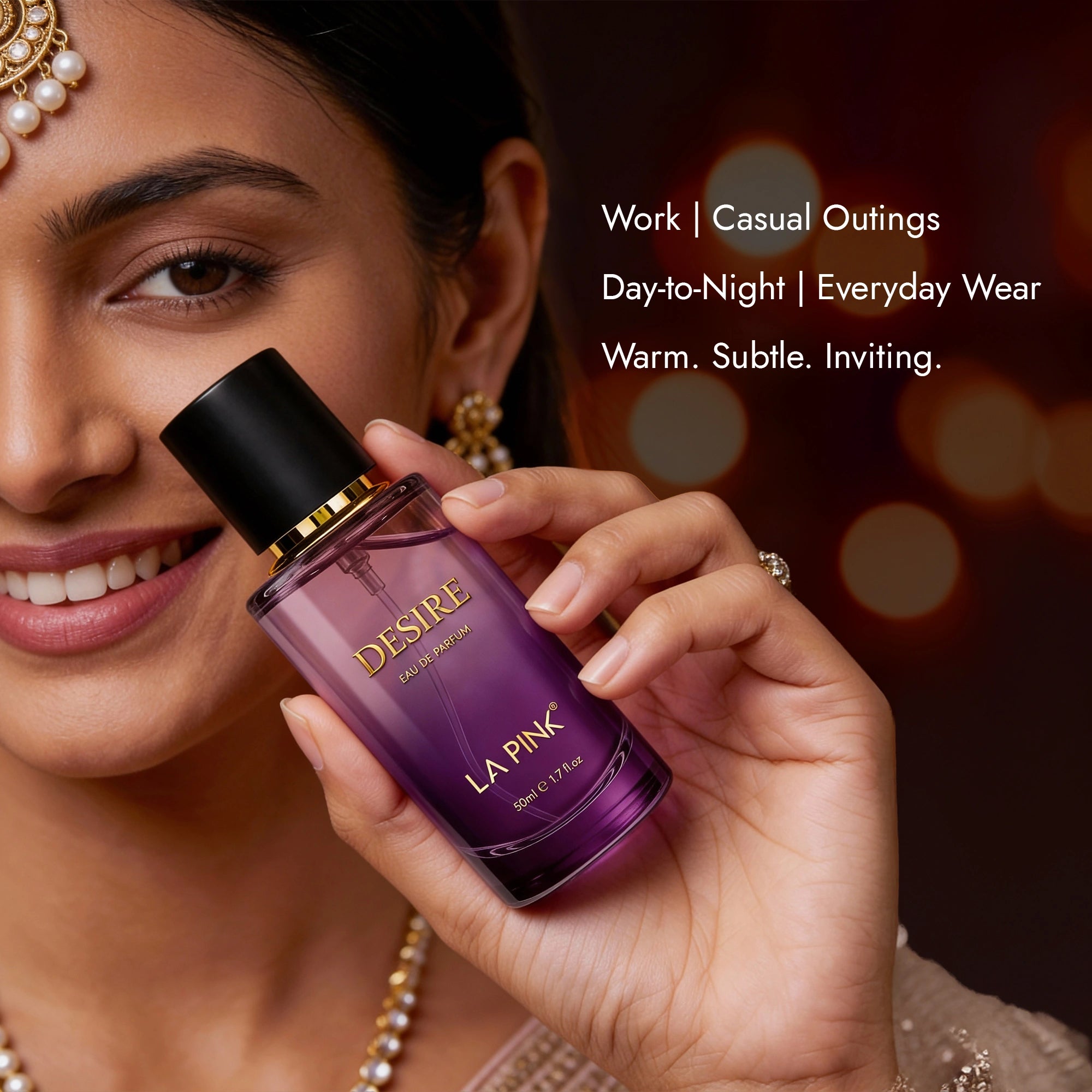Woman holding a purple perfume bottle with text about the product&
