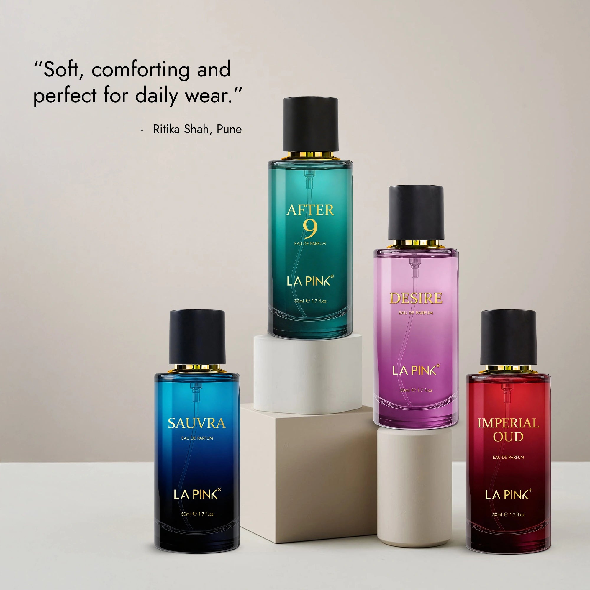 Four bottles of La Pink perfume on a light background with product names and a quote.