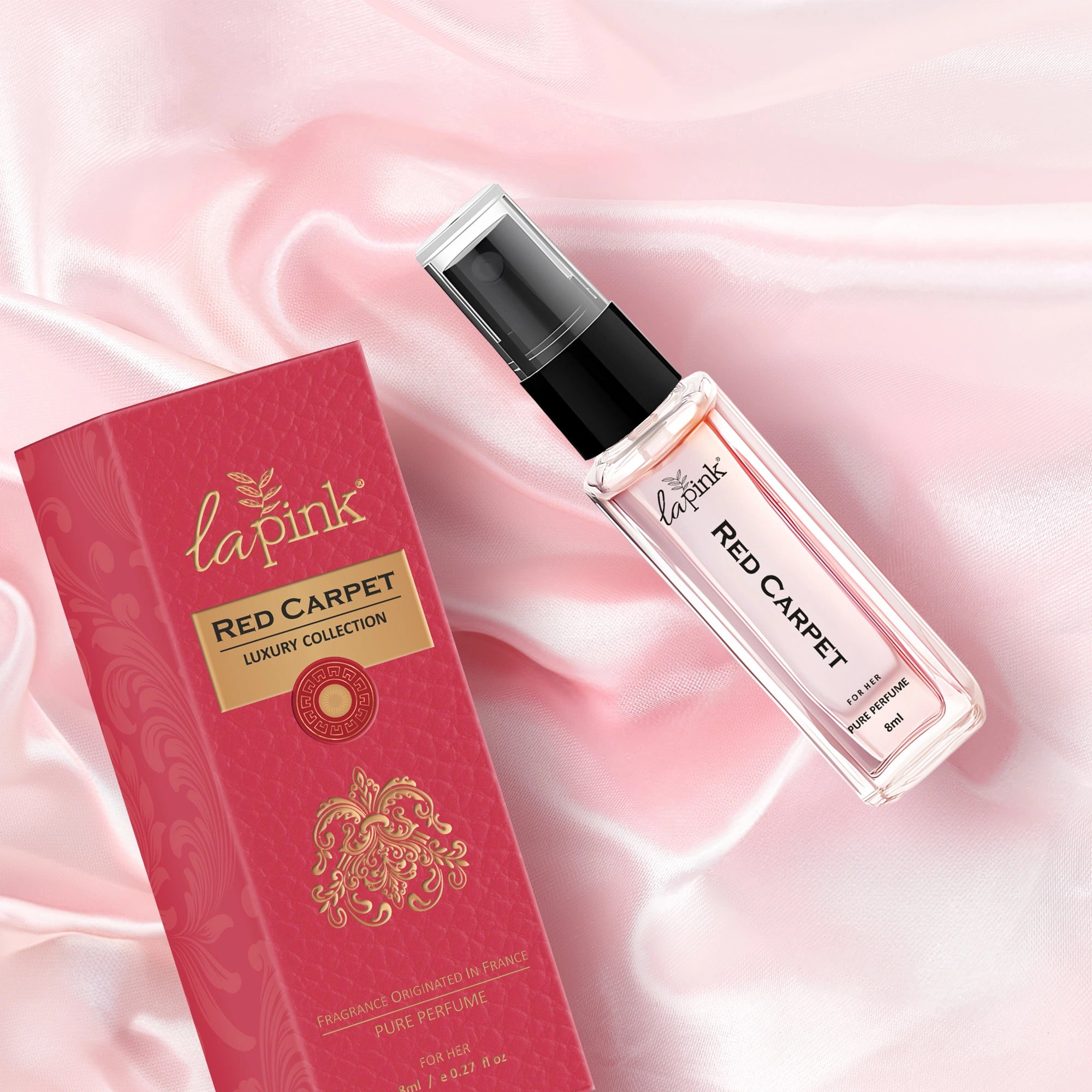 La Pink Red Carpet perfume bottle and packaging on a pink background