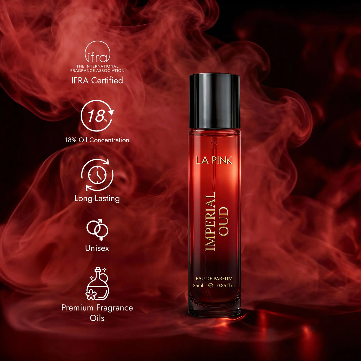 A bottle of LA PINK Imperial Oud Eau de Parfum stands against a dark red smoky background. The bottle is transparent, showing deep red fragrance oil inside, and has a black cap.

