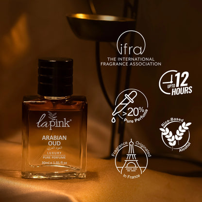 La Pink Arabian Oud perfume bottle with brand logos and product features on a warm-toned background