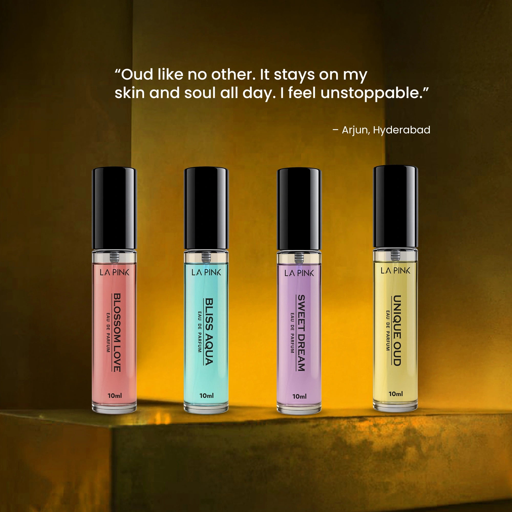 Four perfume bottles with different colored caps on a reflective surface, with a quote above them.