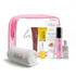 La Pink skincare product set with pink travel pouch on a white background