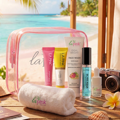 Cosmetic bag with La Pink skincare products on a beach setting