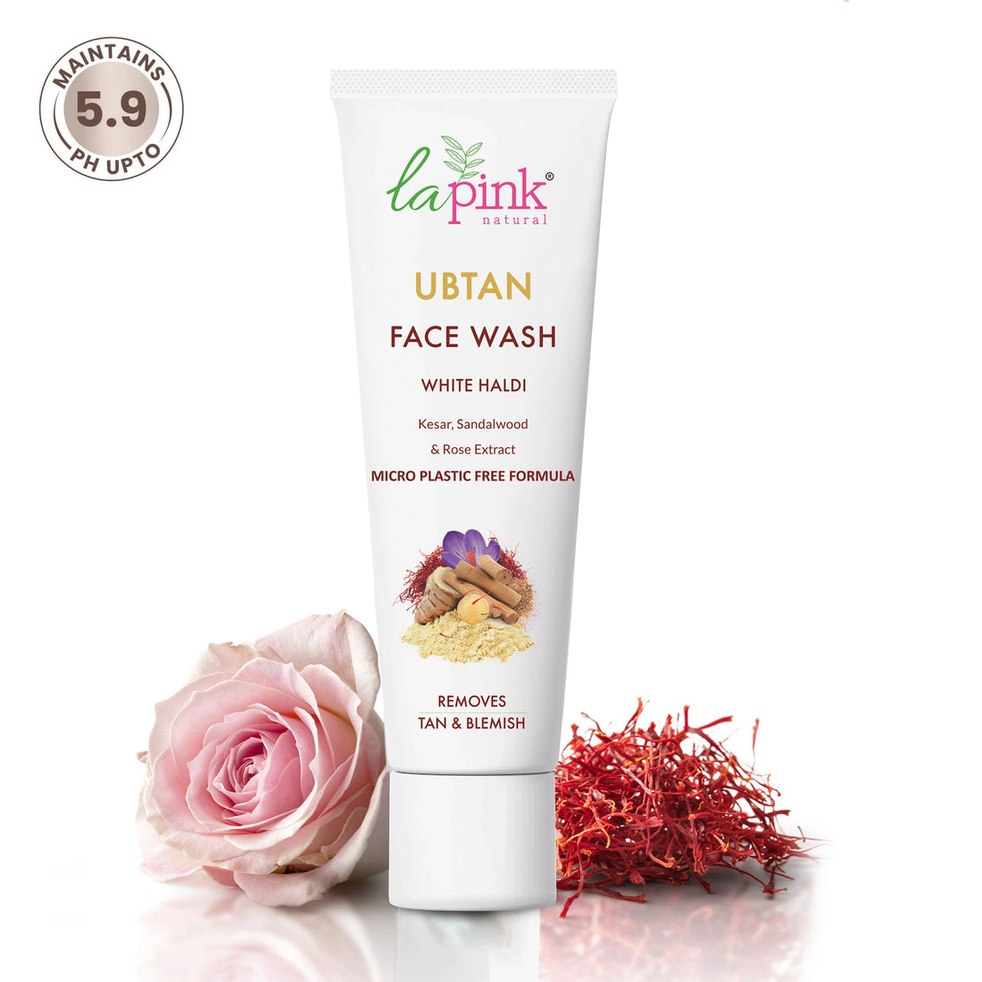Tube of La Pink Ubtan Face Wash with a pink rose and red dried flowers on a white background