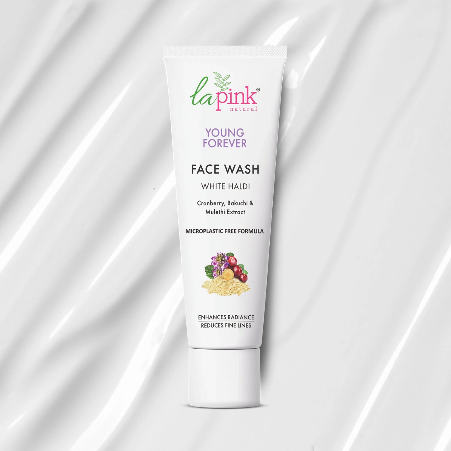 Tube of La Pink Young Forever Face Wash on a white fabric background