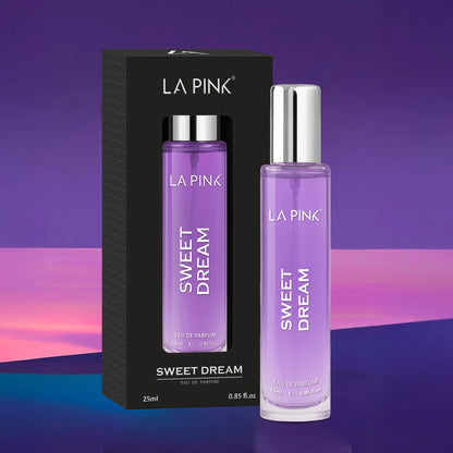 LA Pink Sweet Dream perfume bottle and packaging on a purple and blue gradient background