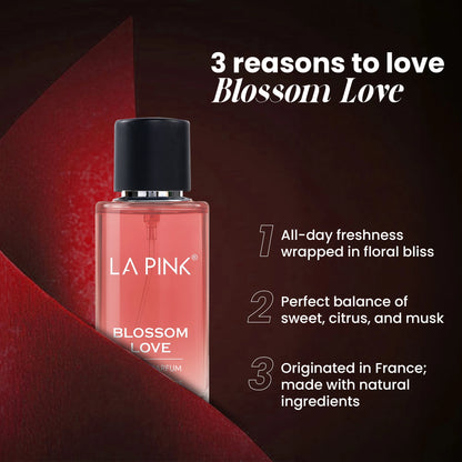 LA Pink Blossom Love perfume bottle with promotional text on a dark background