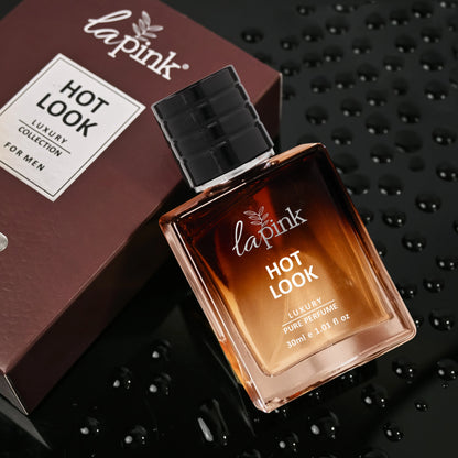 La Pink Hot Look perfume bottle and packaging on a dark textured background