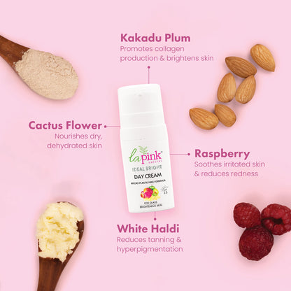 Day cream with ingredients like Kakadu Plum, Cactus Flower, Raspberry, and White Haldi on a pink background