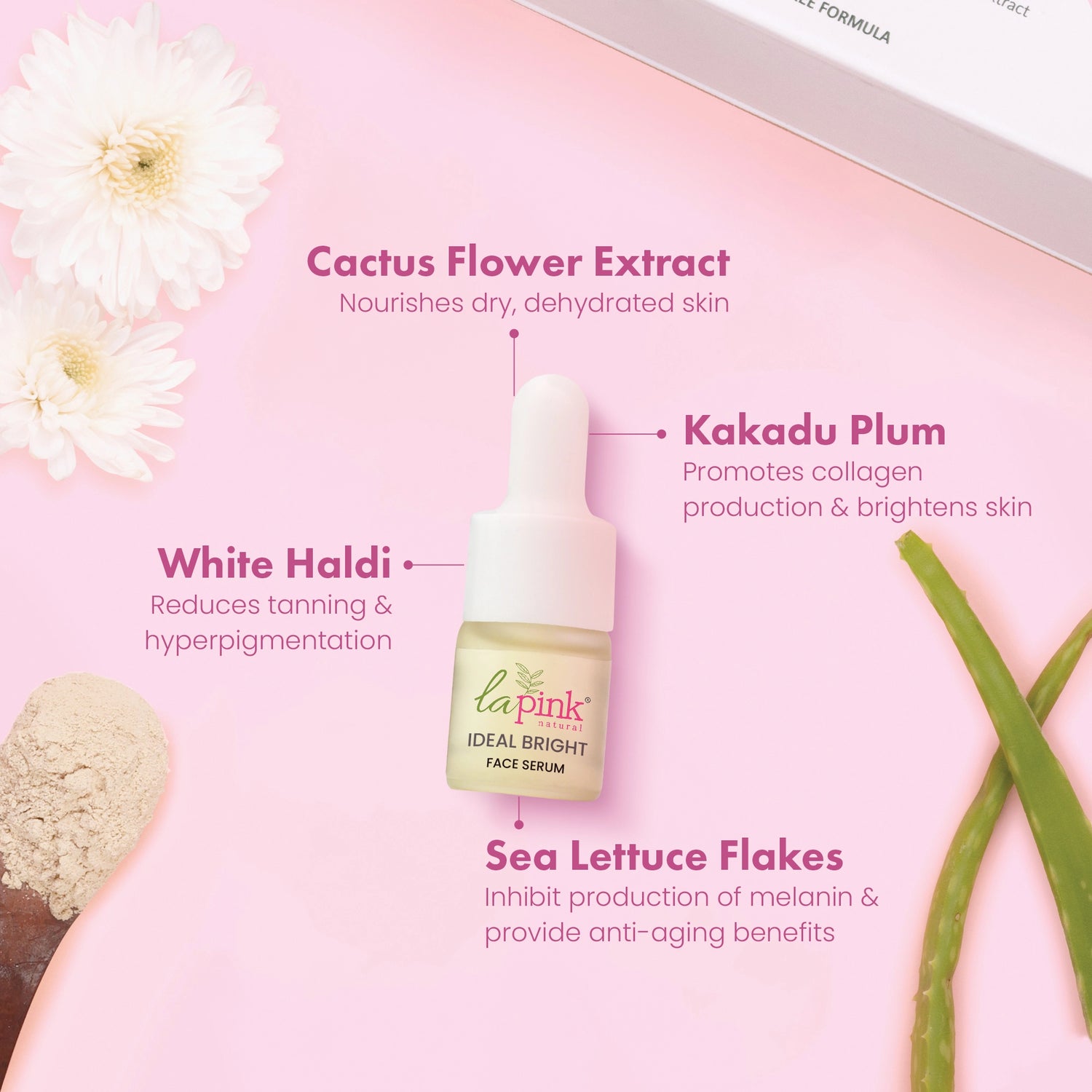 Face serum bottle with ingredients on a pink background