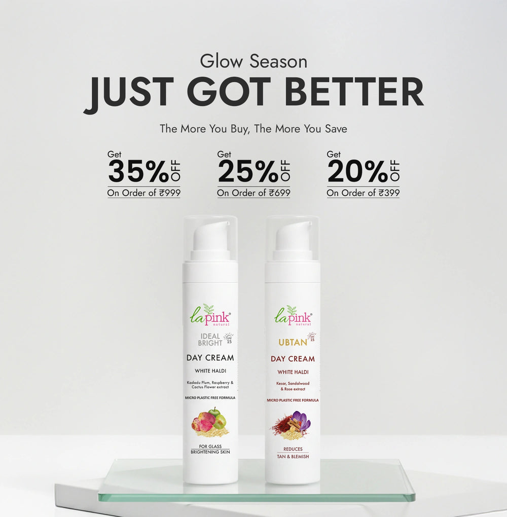 Two bottles of La Pink day cream on a glass shelf with promotional text above.