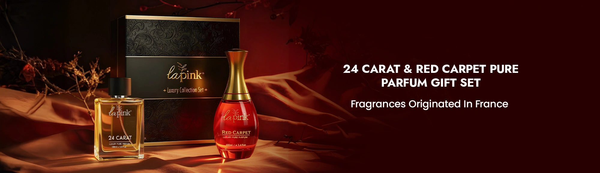 La Rive 24 Carat & Red Carpet Pure Parfum gift set with two bottles on a dark background.