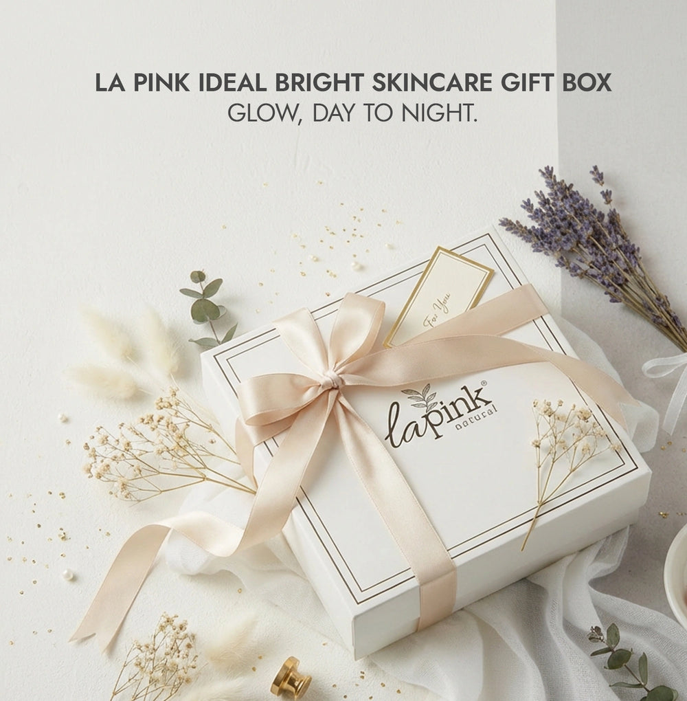 LA Pink skincare gift box with a bow on a light background