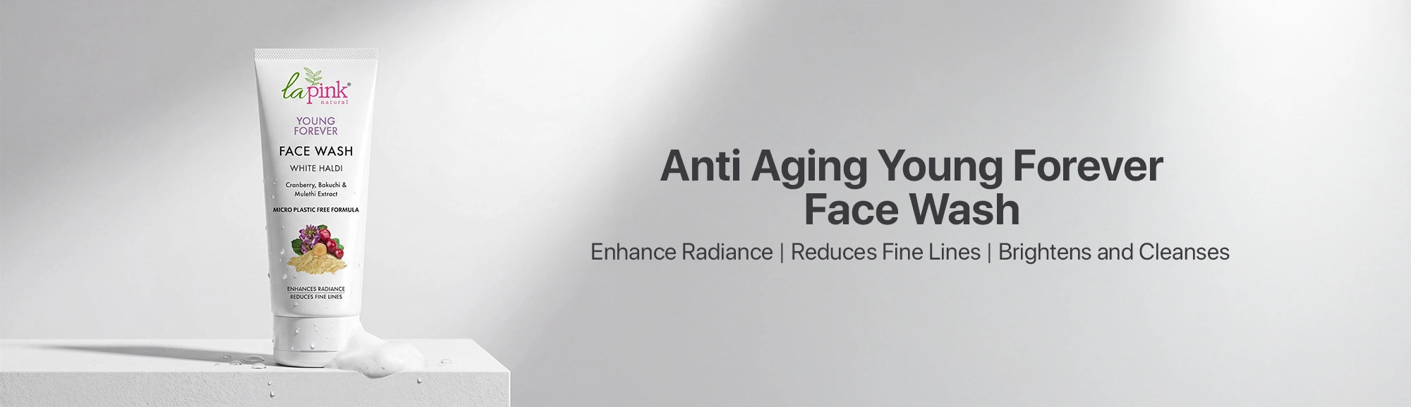 Tube of 'Anti Aging Young Forever Face Wash' on a white background
