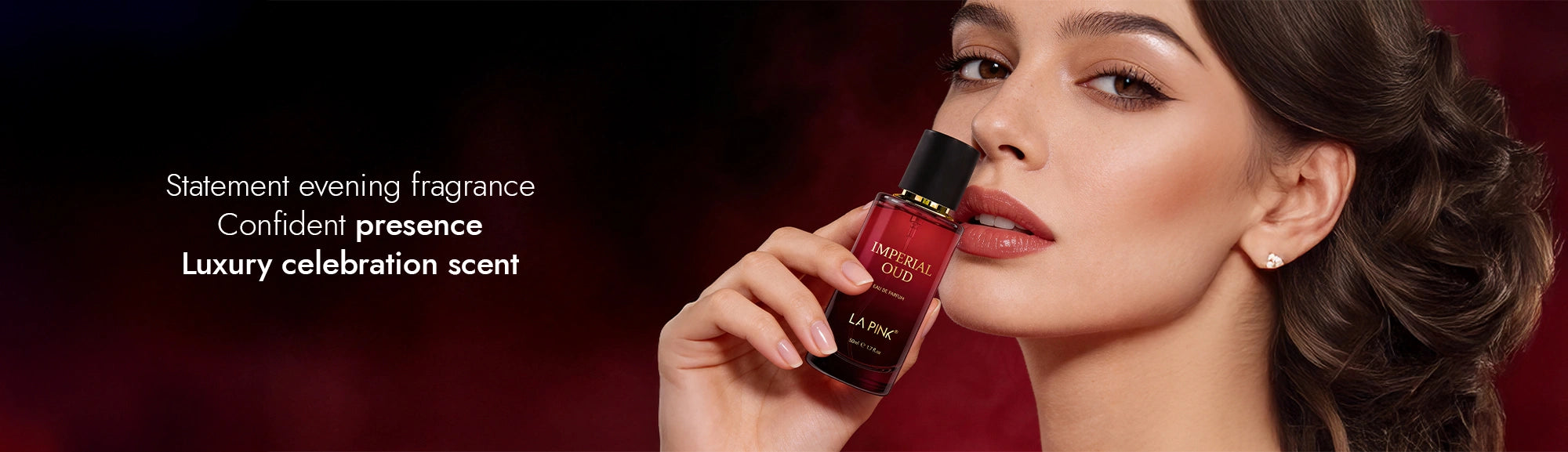 Woman holding a red bottle of perfume with text about fragrance characteristics on a dark background