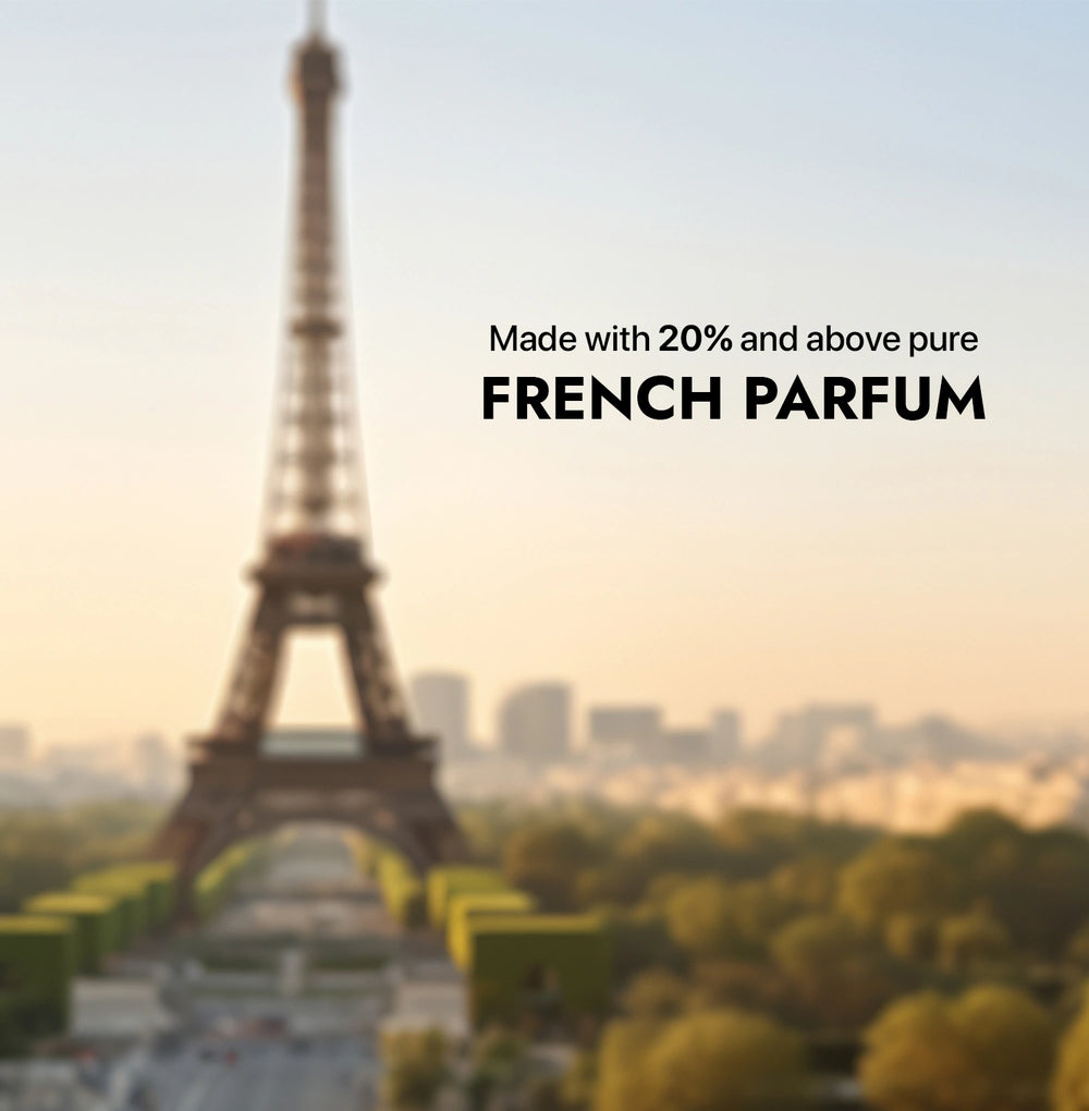 Blurred image of the Eiffel Tower with text about French perfume