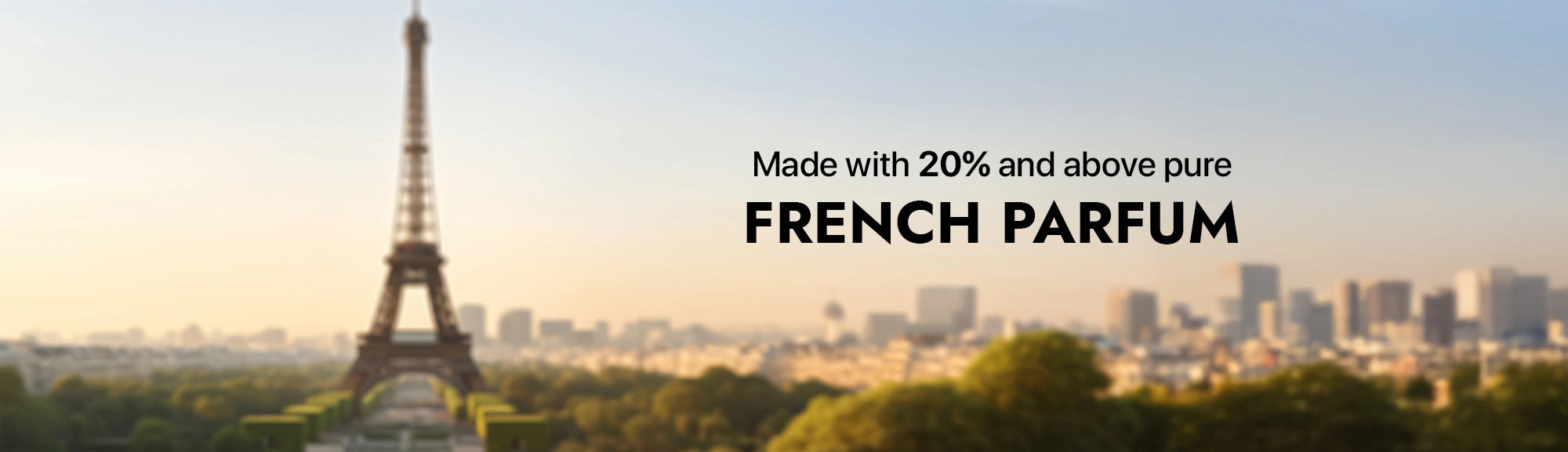 Cityscape with Eiffel Tower and text about French perfume