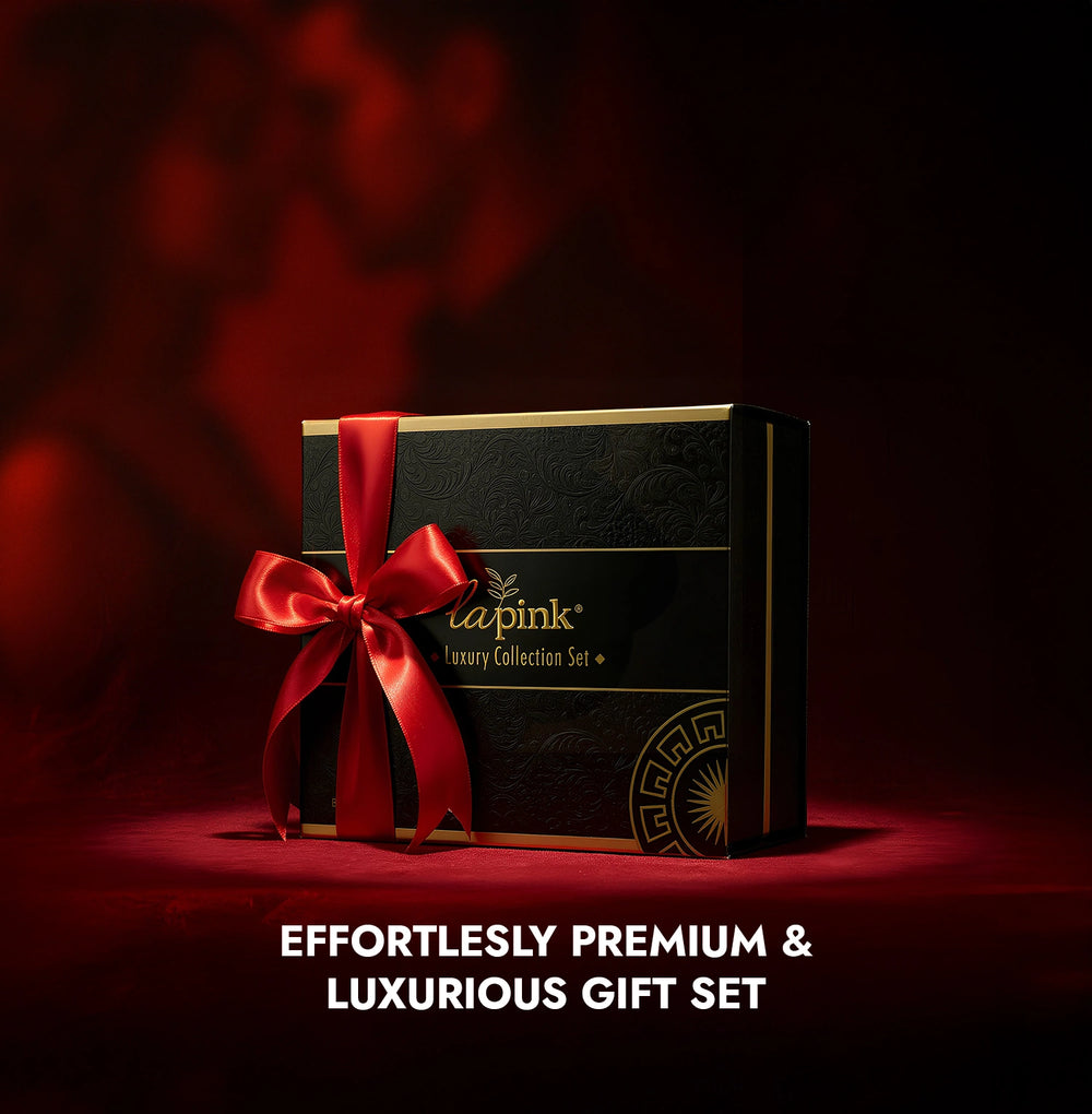 Luxury gift set with a red ribbon on a dark background