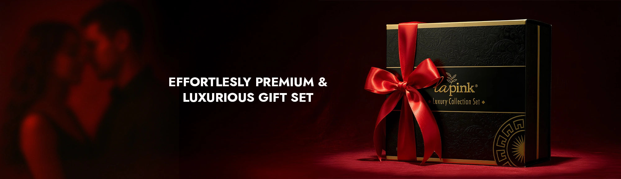 Luxurious gift set with a red ribbon on a dark background