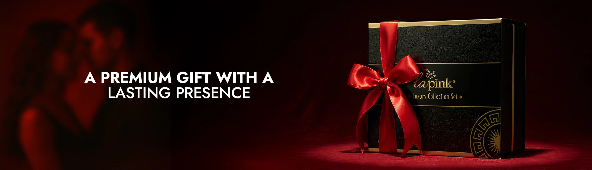 Black gift box with a red ribbon on a dark background, featuring the brand 'caprice'.