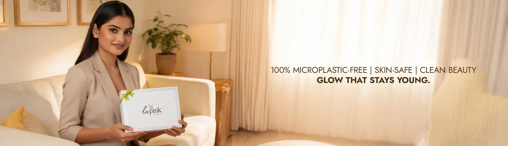Woman holding a box with 'La Roche-Posay' branding in a living room setting.