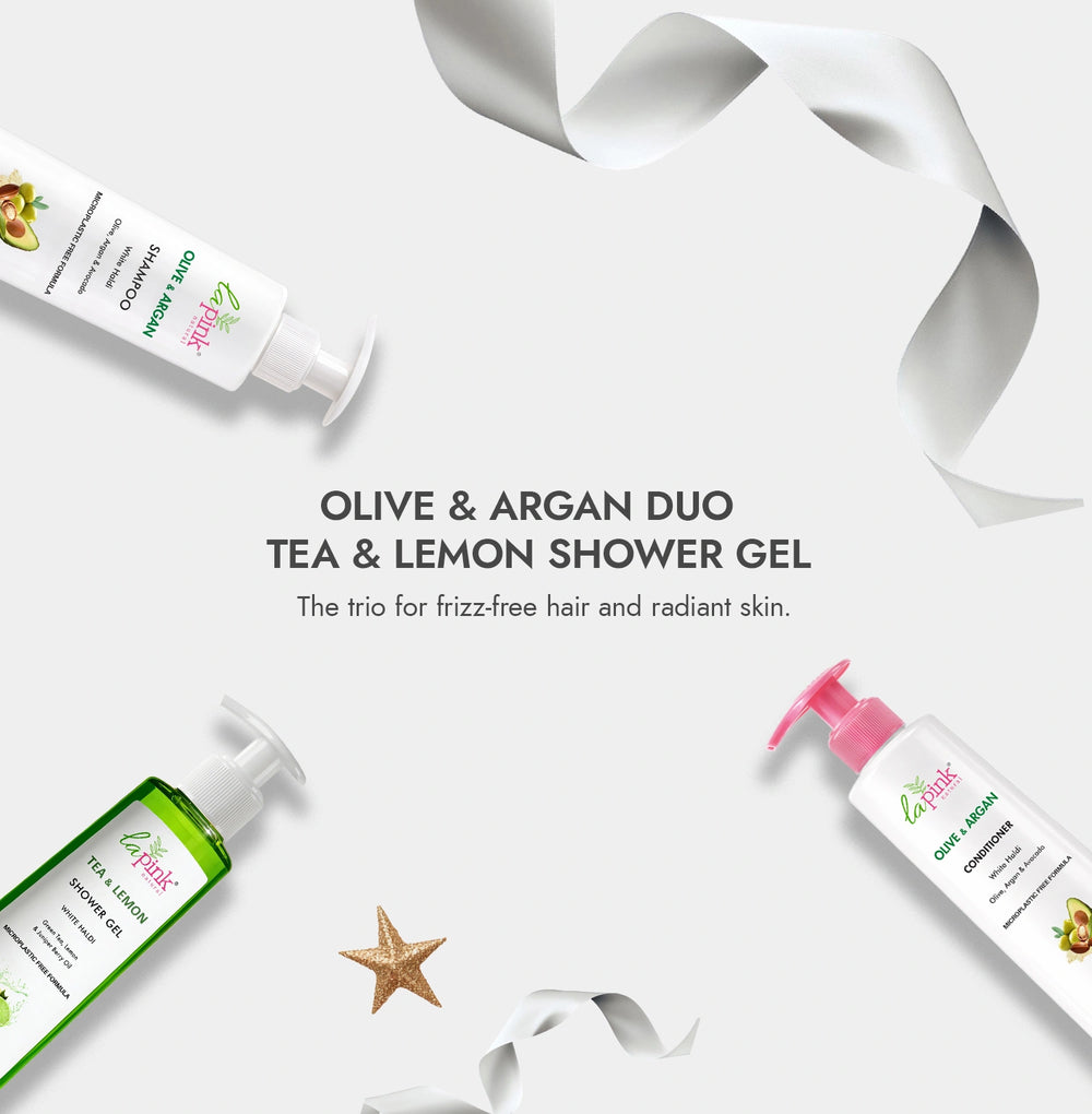 Olive & Argan Duo Tea & Lemon Shower Gel with olive oil bottle and starfish on a white background