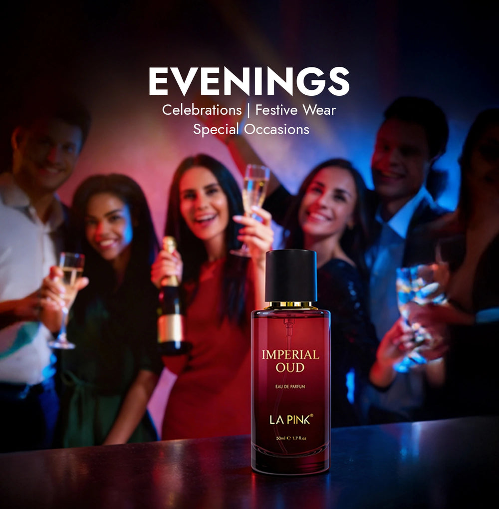 Bottle of La Pink Imperial Oud perfume with people celebrating in the background