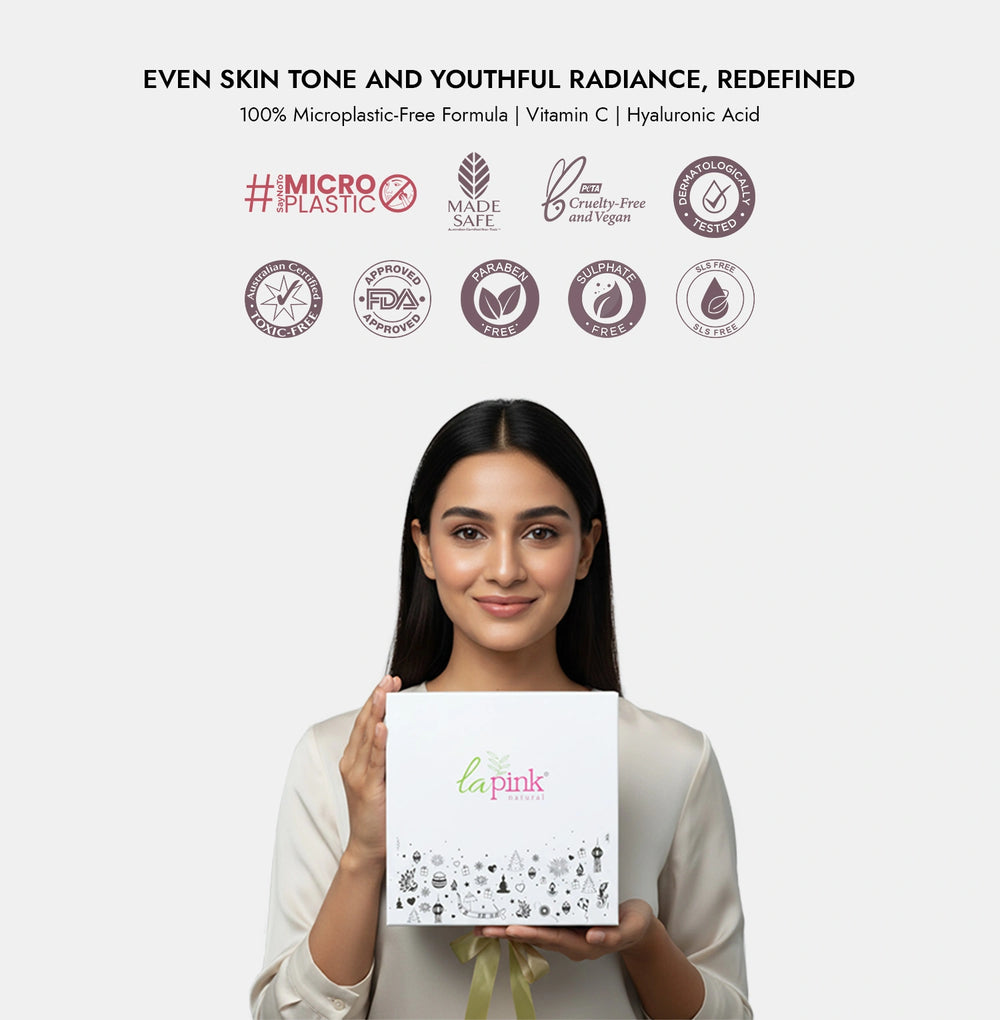 Woman holding a product box with 'la pink' branding against a white background