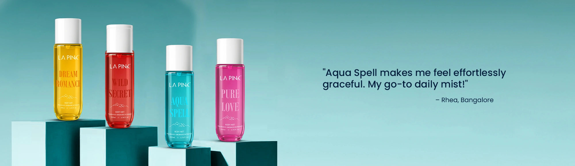 Four bottles of different colors on a blue background with a quote about 'Aqua Spell'.