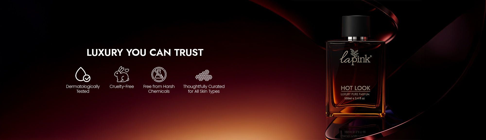 La Pink Hot Look perfume bottle with branding and product details on a dark background