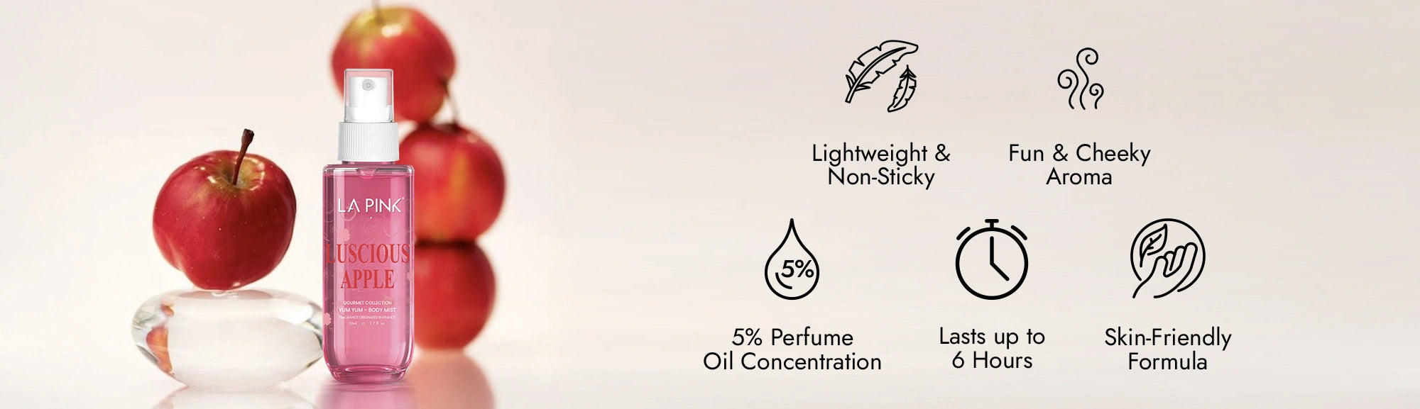 Pink bottle of perfume with an apple on a light background, featuring text about product features.