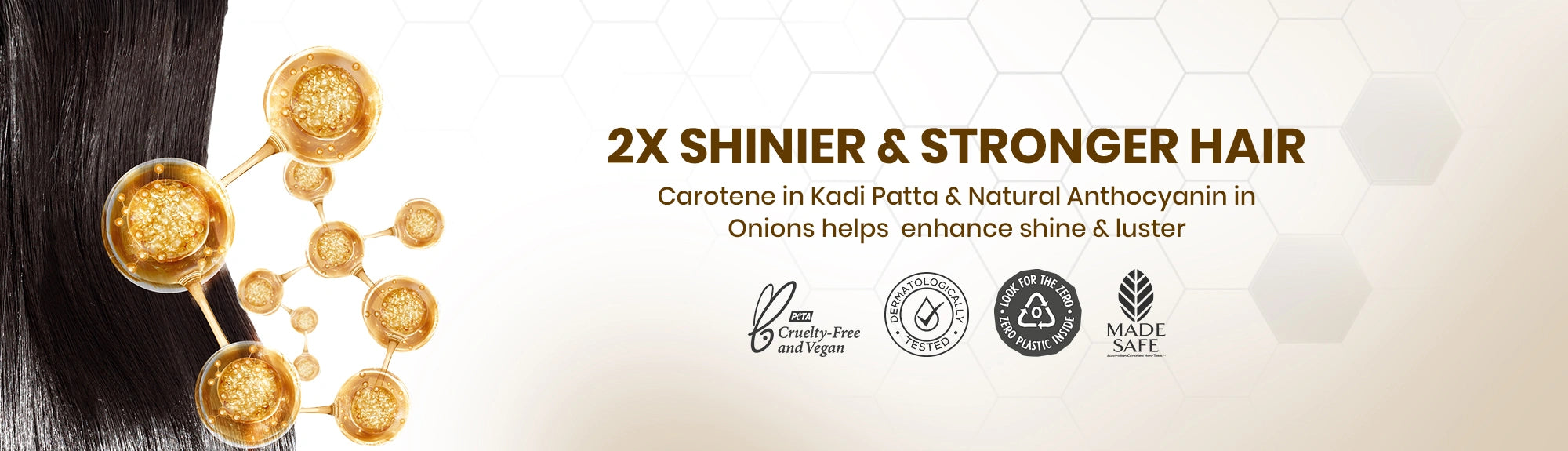 Advertisement for hair care product with gold elements and text about shinier and stronger hair.