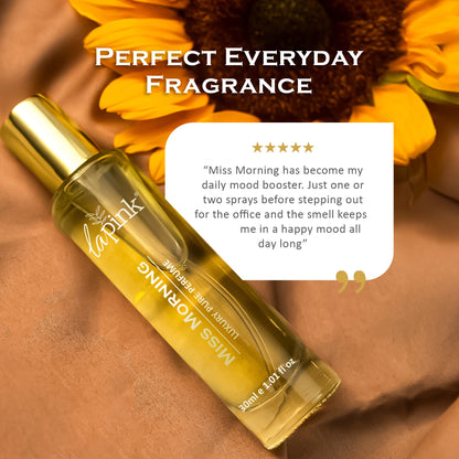 La Rikk Miss Morning perfume bottle with sunflower on a brown background
