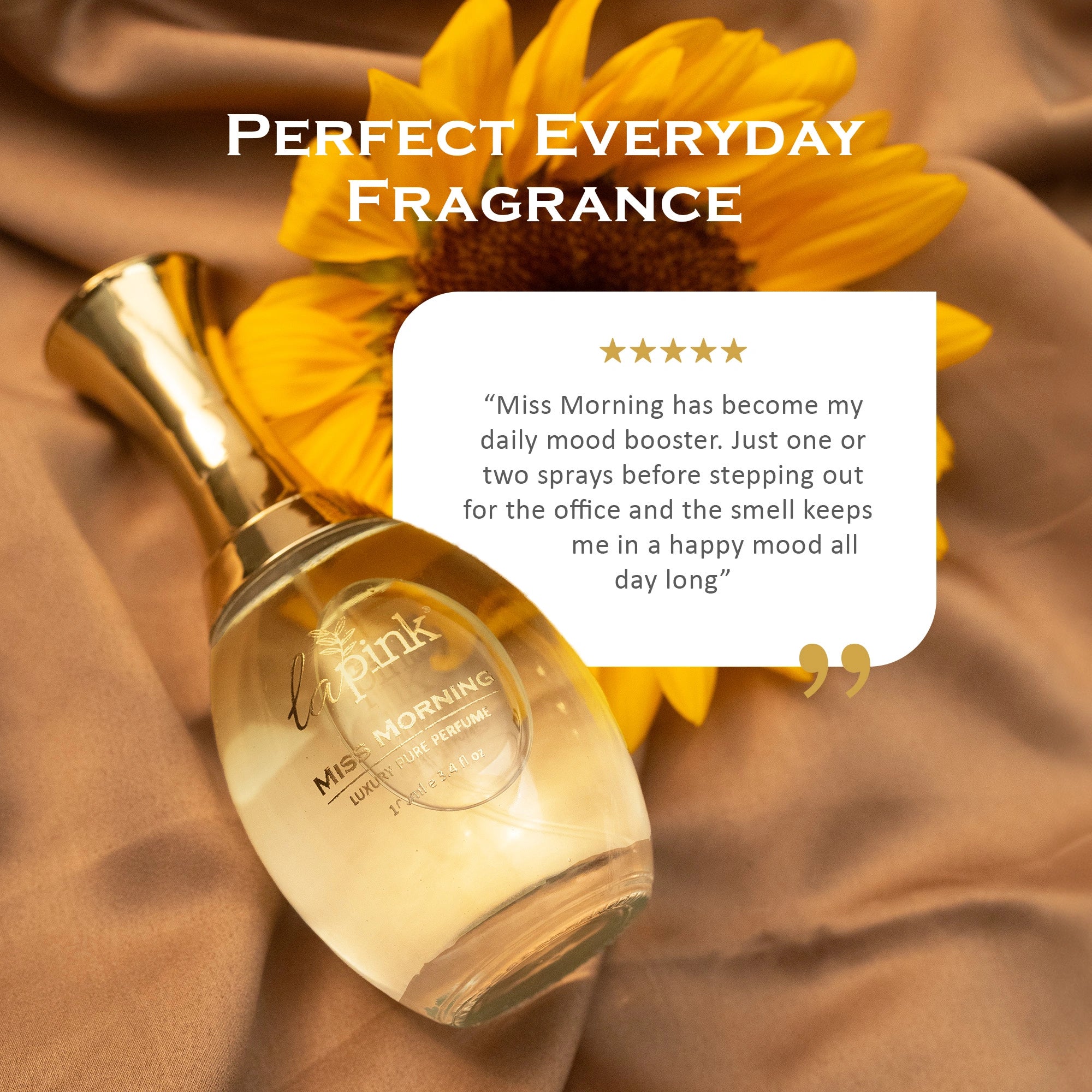 Perfume bottle with sunflower on a brown fabric background, labeled &