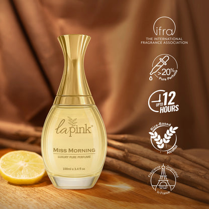 Gold perfume bottle labeled &