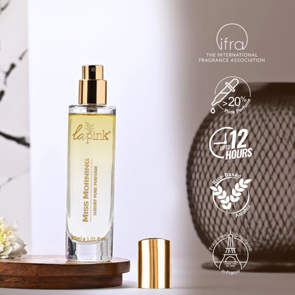 La Pink perfume bottle with gold cap on a white background, featuring IFRA logo and product details.