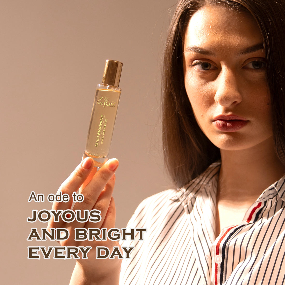 Woman holding a bottle of skincare product with text on a beige background