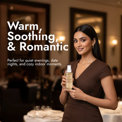 Woman holding a bottle of perfume with text &