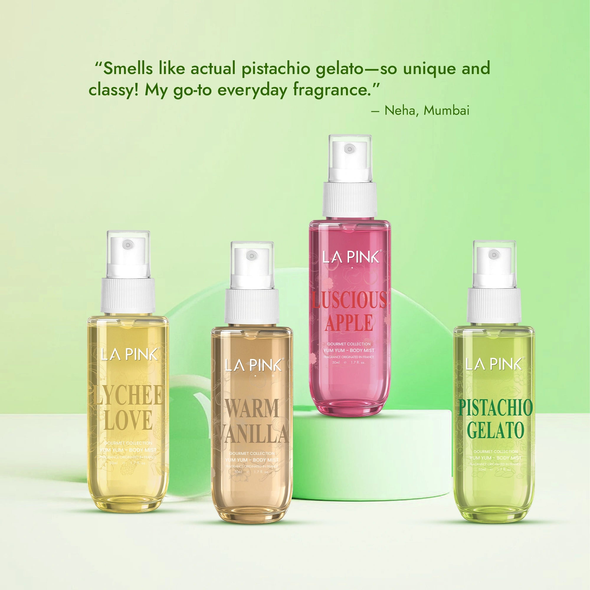 Four bottles of LA Pink fragrances on a green background with product names and customer review.