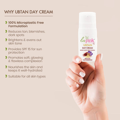Hand holding a bottle of Ubtan Day Cream with product details on a beige background