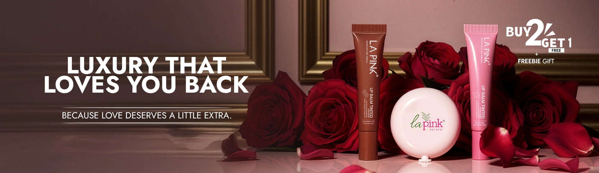 L'Oreal products with red roses on a decorative background