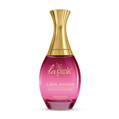 Pink perfume bottle with gold cap on a white background