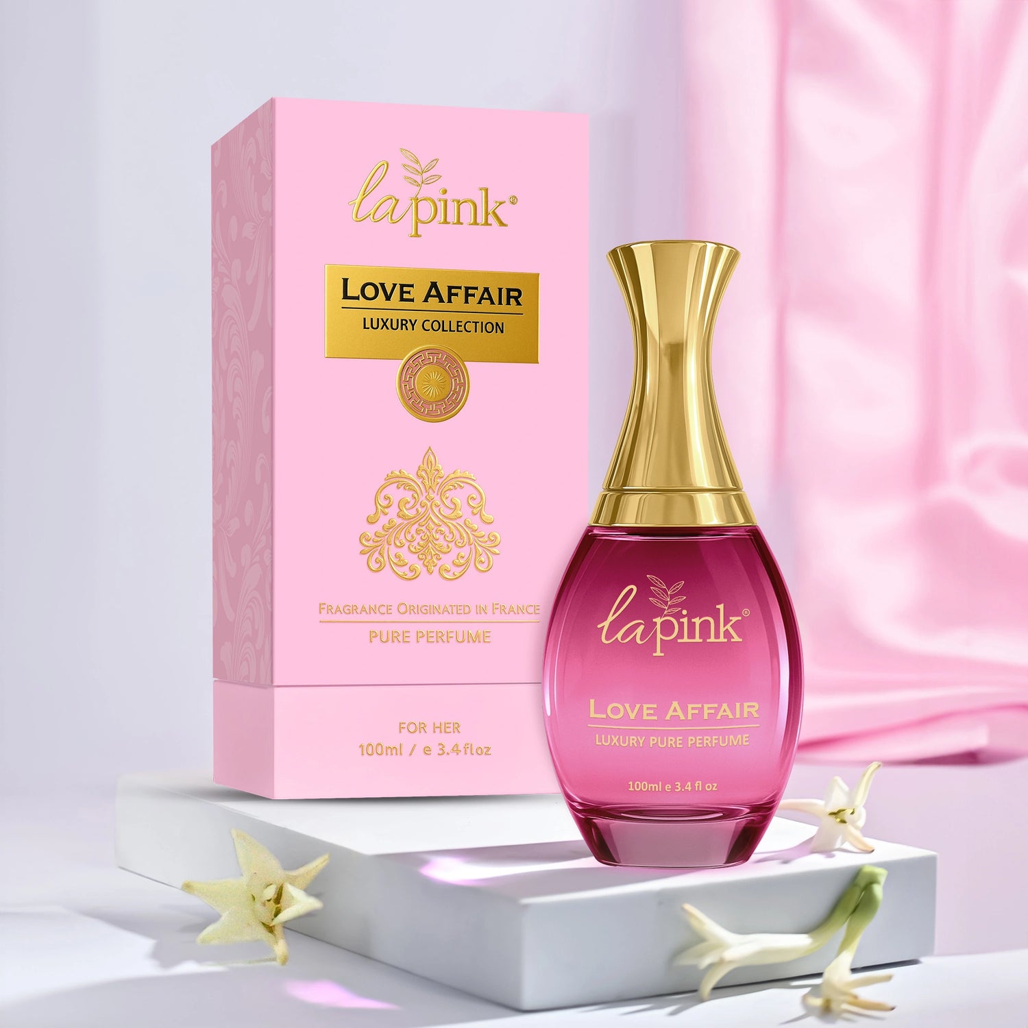 La Pink Love Affair perfume bottle and packaging on a light pink background