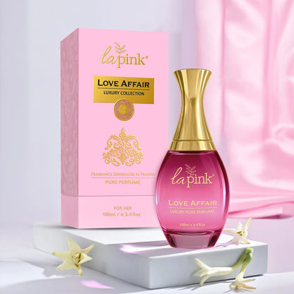 La Pink Love Affair perfume bottle and packaging on a light pink background