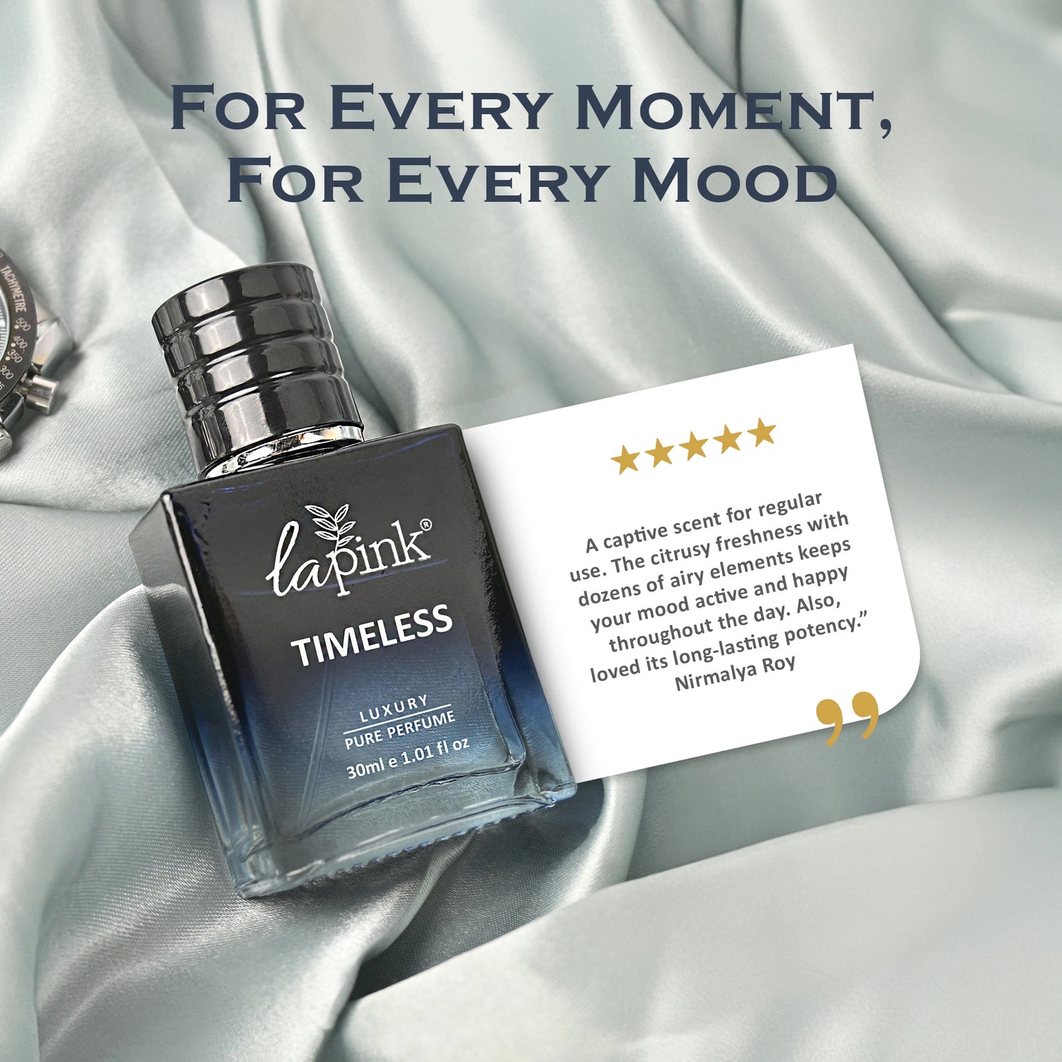 Lapink Timeless perfume bottle with a five-star review card on a satin background
